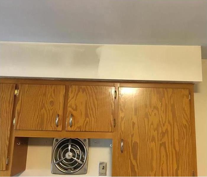 white wall and cabinets 